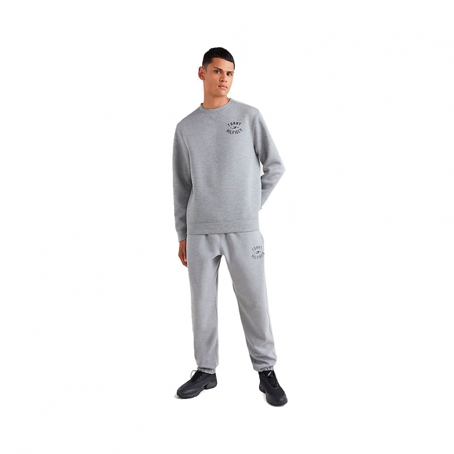 JOGGERS CON LOGO GRAFICO UNIVERSITY